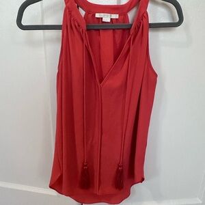 Cute tank with fringe strings in the front